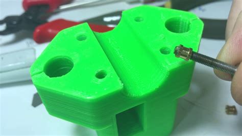 attaching sheet metal to 3d printed part|inserting metal into 3d printed part.